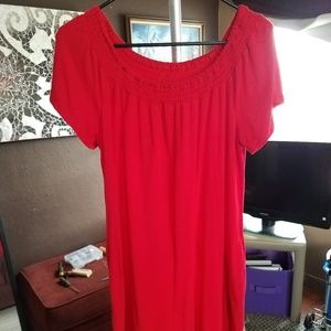 Red knee length sun dress.